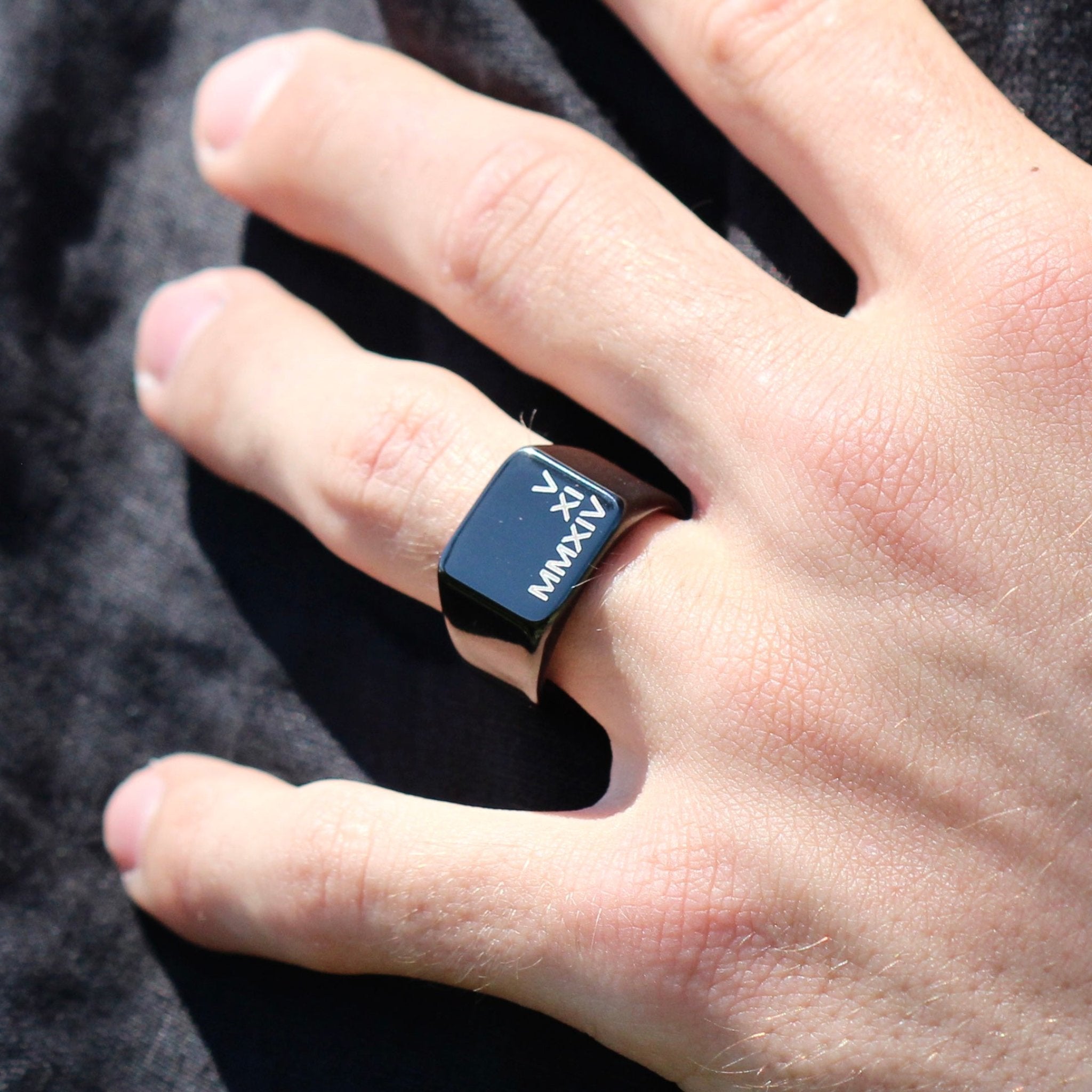 black ring, Roman numerals engraved