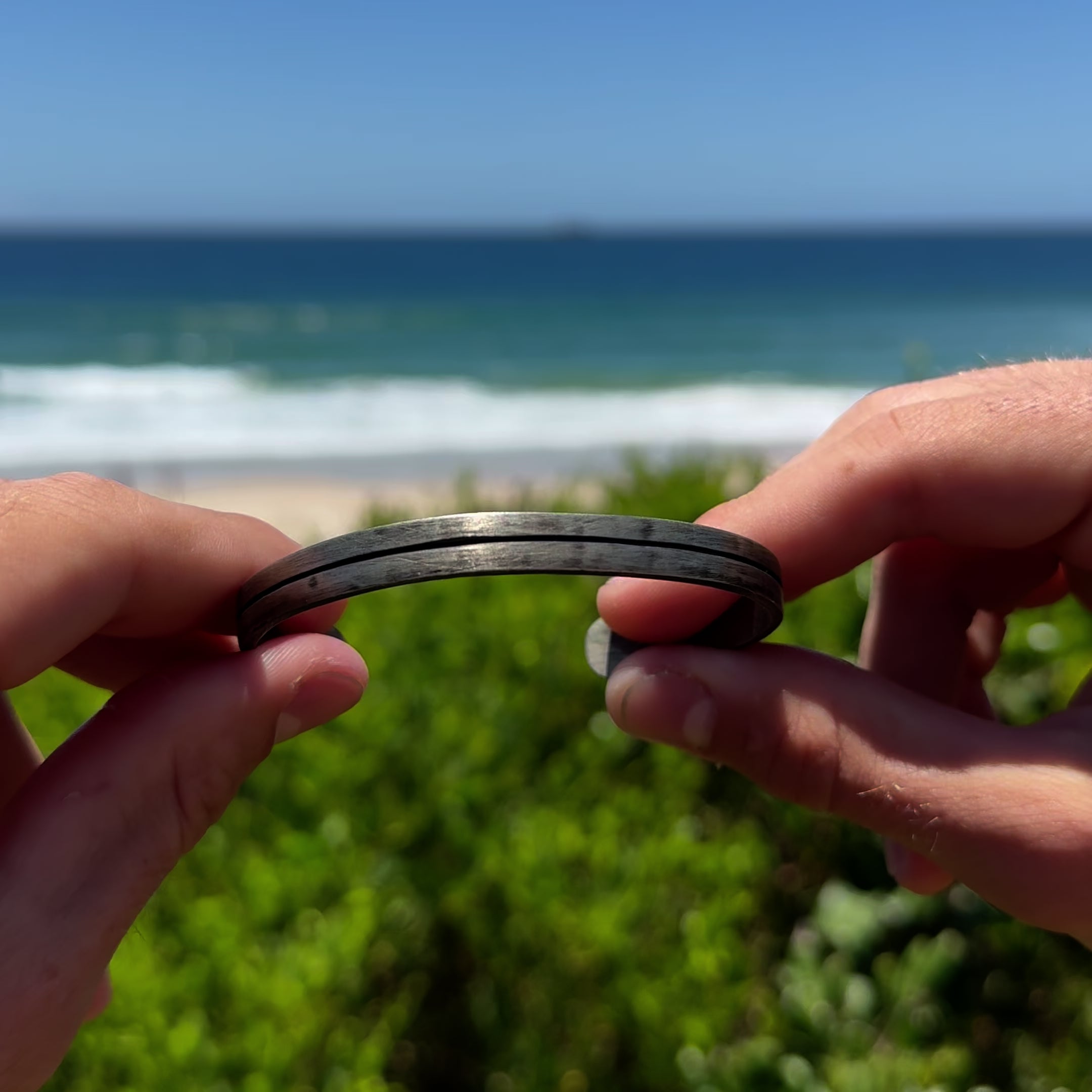 mens black line silver cuff bracelet